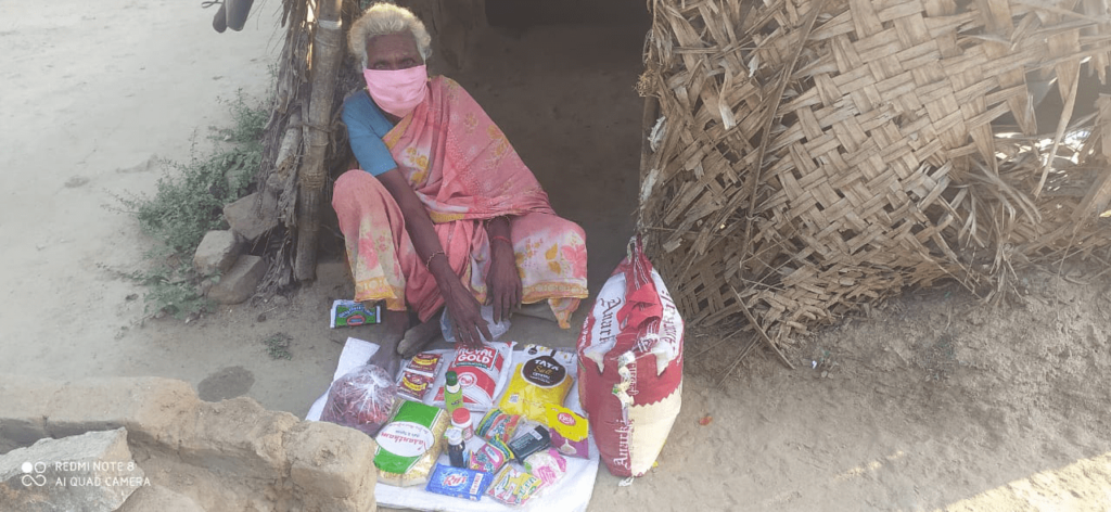 Ms. Pushpavalli in her house with a Hope for the Elderly rationing kit