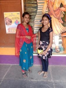 Ruchita with her Hope Learning Station teacher.