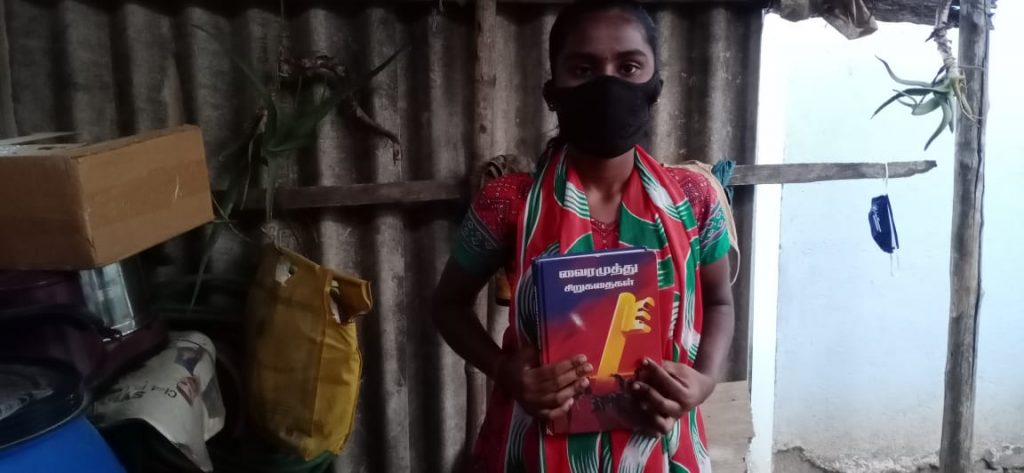 Hope Student Yazhini showing her literature books.