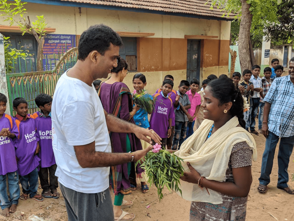 Hope Sponsor Krishna Bhaavin Shah giving gifts to Hope Children.