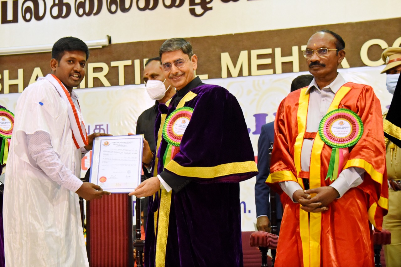 Dr. Karthik receving the Ph.D